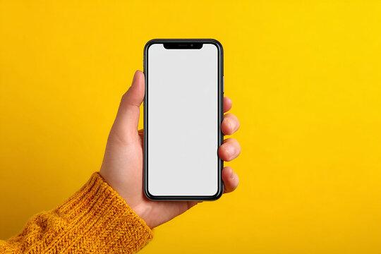 Smartphone in hand with a blank screen for your business and communication technology message