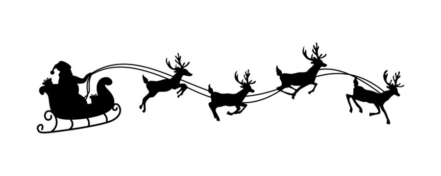 silhouette of santa claus riding sleigh with flying reindeer