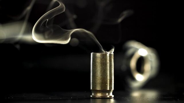 Smoke from the cartridge case after the shot. Filmed on a high-speed camera at 1000 fps. High quality FullHD footage