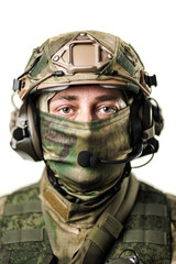Fototapeta premium Close-up of a Soldier in Tactical Gear on a White Background