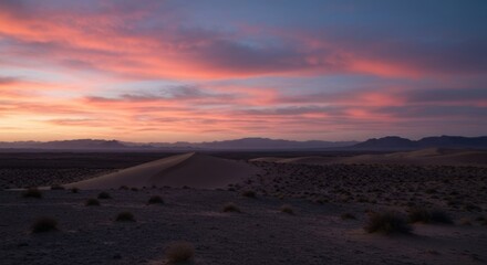 Desert dune landscape at dawn, soft pink sunrise