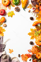 Autumn flat lay background with pumpkins and leaves.