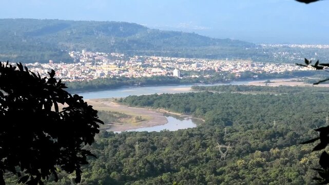 Haridwar cityscape seen from the premises of Chandi Devi Temple, Haridwar, Uttarakhand, India | The river Ganges (Ganga) is also seen