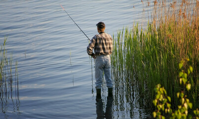 A man fishing on a lake