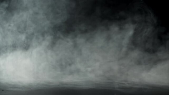 Smoke on a black background. Filmed on a high-speed camera at 1000 fps. High quality FullHD footage