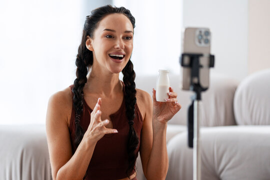 Woman vlogging about healthy eating and fitness lifestyle