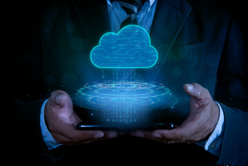 Businessman with cloud computing diagram show on virtual screen. Concept cloud computing with data streams transferring, symbolizing cloud technology and data management.