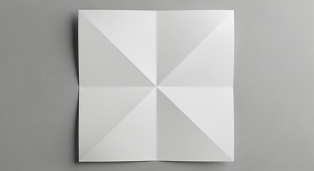 Folded paper mockup on gray background