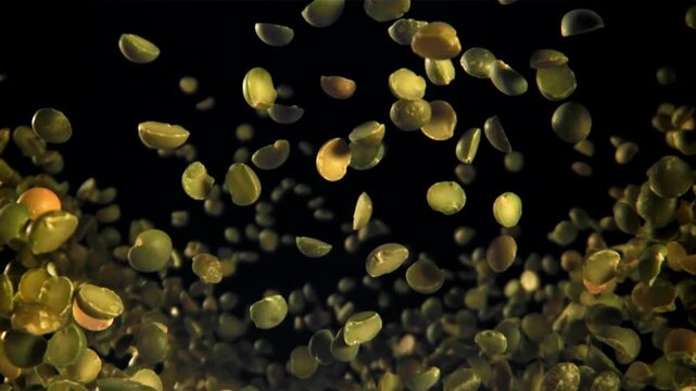 Green peas fly and fall. Filmed on a high-speed camera at 1000 fps. High quality FullHD footage