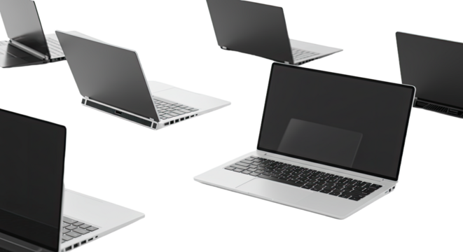 Multiple modern laptops with blank screens isolated on black background, technology and computing concept
