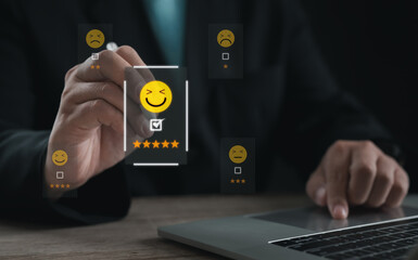 Client using stylus to select happy smiley face on digital feedback interface, representing customer satisfaction, positive experience, rating evaluation, and online service improvement.