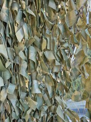 Naklejka premium Camouflage netting for military equipment
