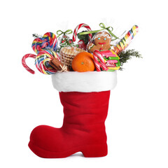 Saint Nicholas day. Red boot with treats and fir branches isolated on white