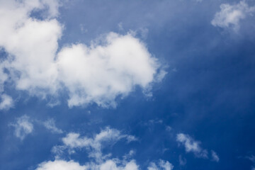 Serene Blue Sky with Fluffy White Cumulus Clouds - Clean Nature Background