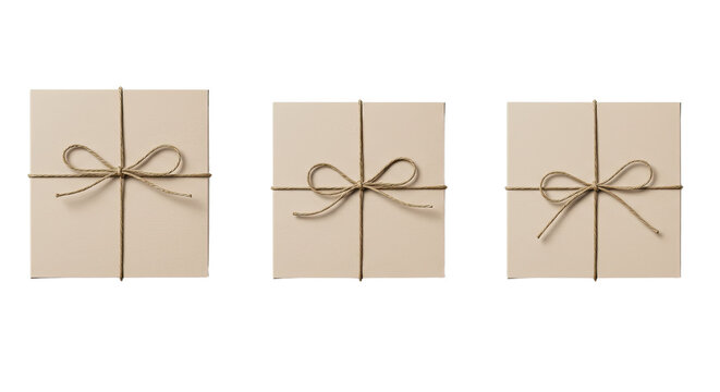 Three neatly wrapped beige gift boxes with brown string bows isolated on white background, perfect for minimalist holiday or birthday celebrations