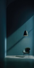 A solitary chair sits in a dimly lit, teal-walled room, bathed in sunlight streaming through a window, illuminated by a single pendant lamp