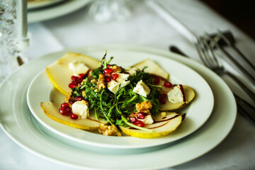 pear gorgonzola salad with arugula and pomegranate