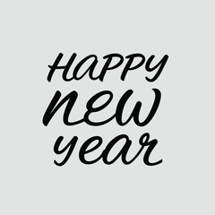 Happy New Year calligraphy on a grey background. Golden hand-drawn text