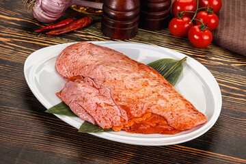 Raw marinated duck breast for cooking