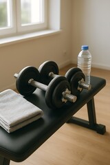 Home gym scene with metal dumbbells, water bottle and towel on black bench near window