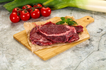 Raw beef cheeks cut for cooking