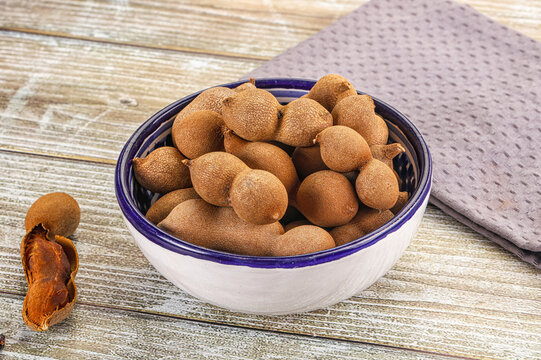 Tropical exotic Tamarind fruit heap