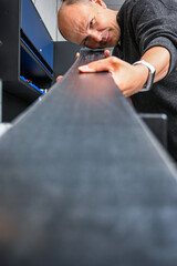 Craftsman focusing on product detail, ensuring quality and precision