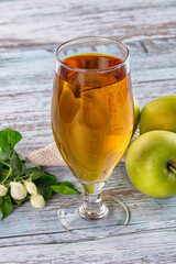 Apple yellow juice in the glass