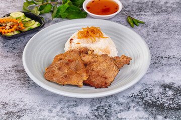 Roasted pork steak with rice