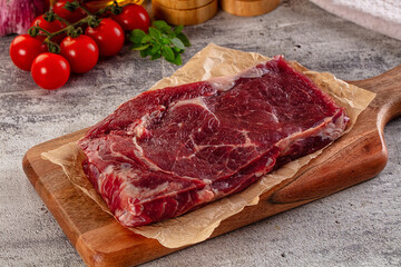 Gourmet raw rib eye steak