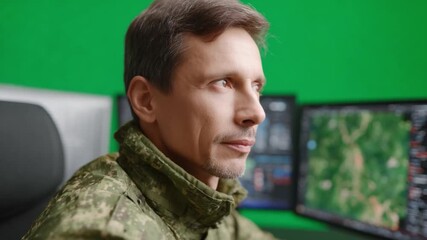 Focused Vision: A determined individual, absorbed in analyzing and strategizing, his gaze fixed intently on the multiple screens. This portrait reveals his focus and expertise.