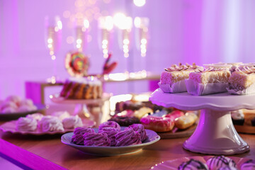Buffet menu. Different delicious desserts on table, selective focus