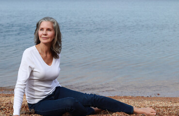 Senior attractive fit woman on the beach