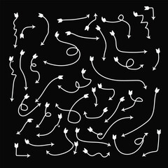 Collection of hand drawn arrows on a black background