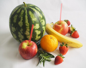 Vibrant and refreshing fruit medley, perfect for a healthy lifestyle campaign featuring watermelon, apples, strawberries, banana and orange