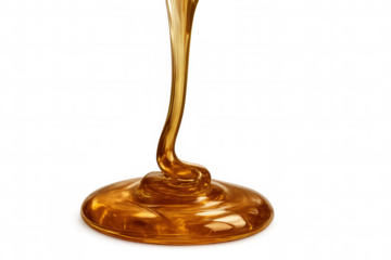 Golden syrup or honey cascading and forming a glossy sweet liquid texture. Clear backdrop for seamless incorporation