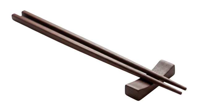 Dark wood chopsticks rest on a small wooden chopstick holder.