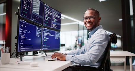Happy African American Web Developer Coding