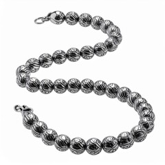 Obraz premium Elegant Silver Ball Bracelet Jewelry with Intricate Pattern on White Surface