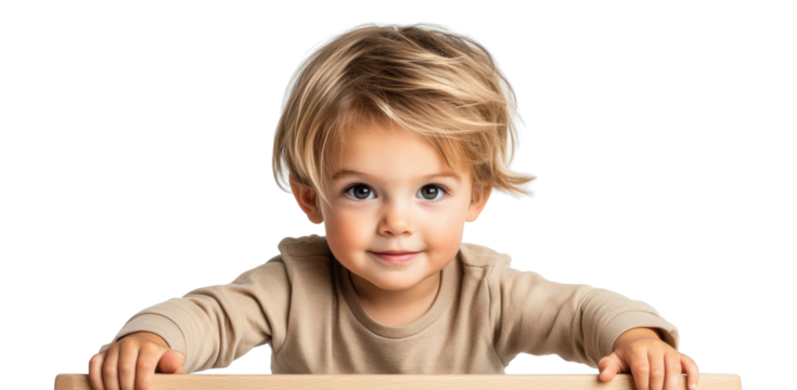 Child smiling behind wooden chair on transparent background