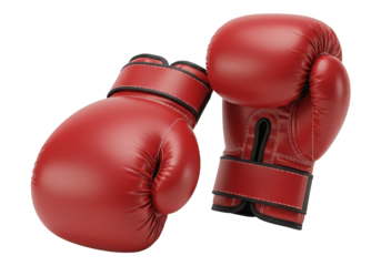 Pair of red boxing gloves rests on a dark surface, ready for combat.