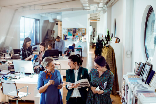 Young adults working in textile company