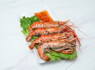 Savor the taste of these delectable grilled prawns. Ideal for menus, blogs, or culinary promotions, they bring a fresh, gourmet touch to any food-related project.