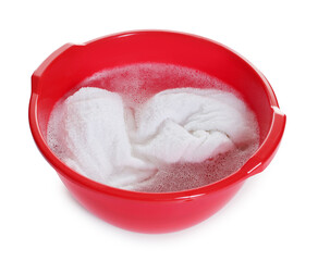 Plastic basin with towel and water isolated on white