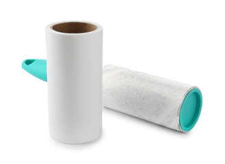 Lint roller with used sticky tape and new adhesive roll isolated on white