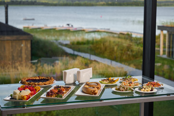 Come and Enjoy a Gourmet Spread by the Beautiful Tranquil Lake A Culinary Delight Awaits You