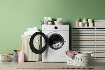 Laundry room with modern washing machine. Interior design