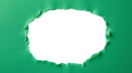 Ripped transparent hole in green paper