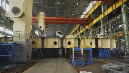 Industrial equipment assembly process in modern factory. Stock clip