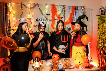 A thrilling Halloween night party with people in scary costumes.
